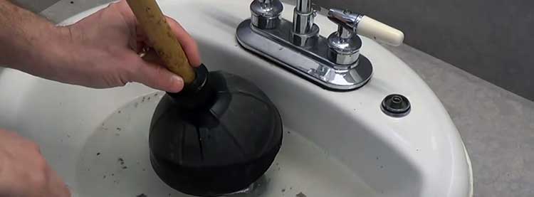 plunging a bathroom sink