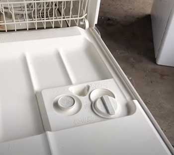 GE dishwasher soap dispenser wont close