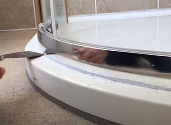 how to seal a leaking shower floor
