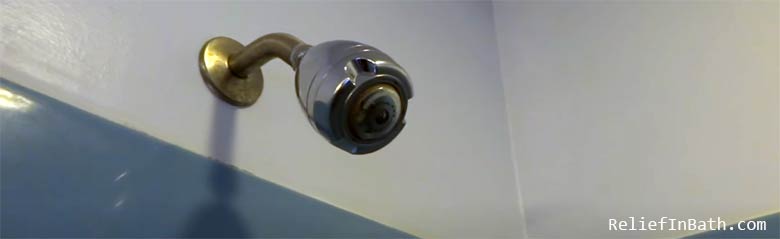 water coming out of shower head when off
