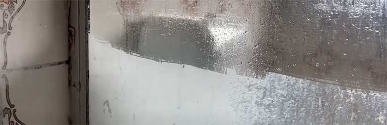 removing ice from sliding glass door