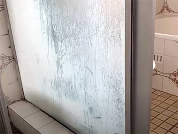 sliding glass door with ice
