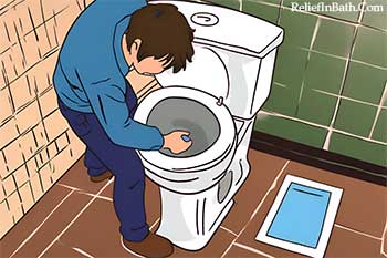 a guy flushing a toilet