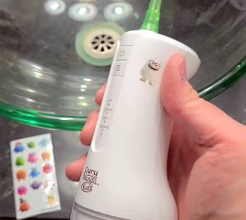 guru nanda water flosser